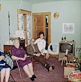 Christmas at the Exchers in Monticello.  Grandmother Elva Dooley and Jim and Shirley Schommer.